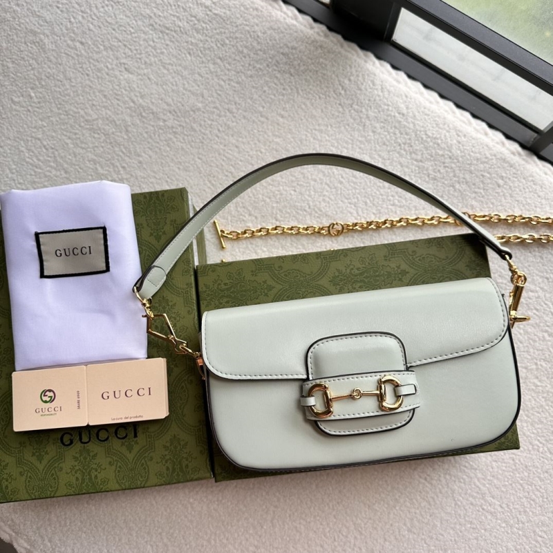 G*u*i top handle bags